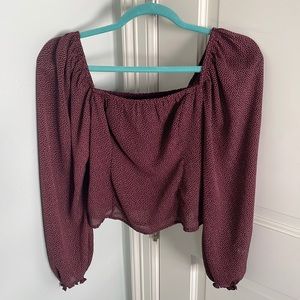 Long sleeve top with maroon with white speckles, cuffed sleeves and ruched